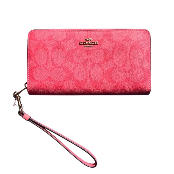 Coach Handbags - Coach Pink Wristlet Zip Around Wallet